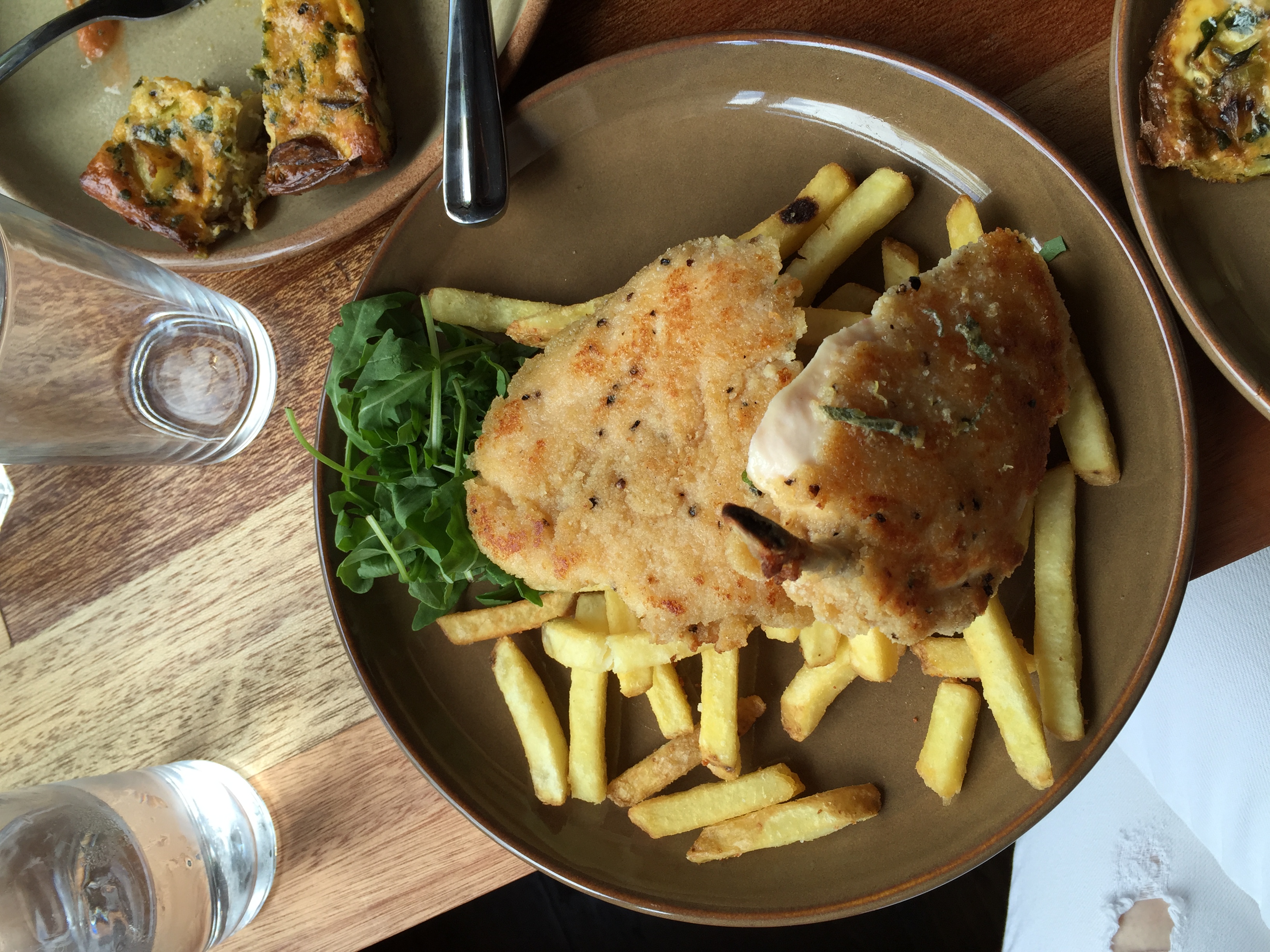 Breaded chicken schnitzel, fries, lemon & sage butter at the Elephant & Castle pub - kenningtonrunoff.com