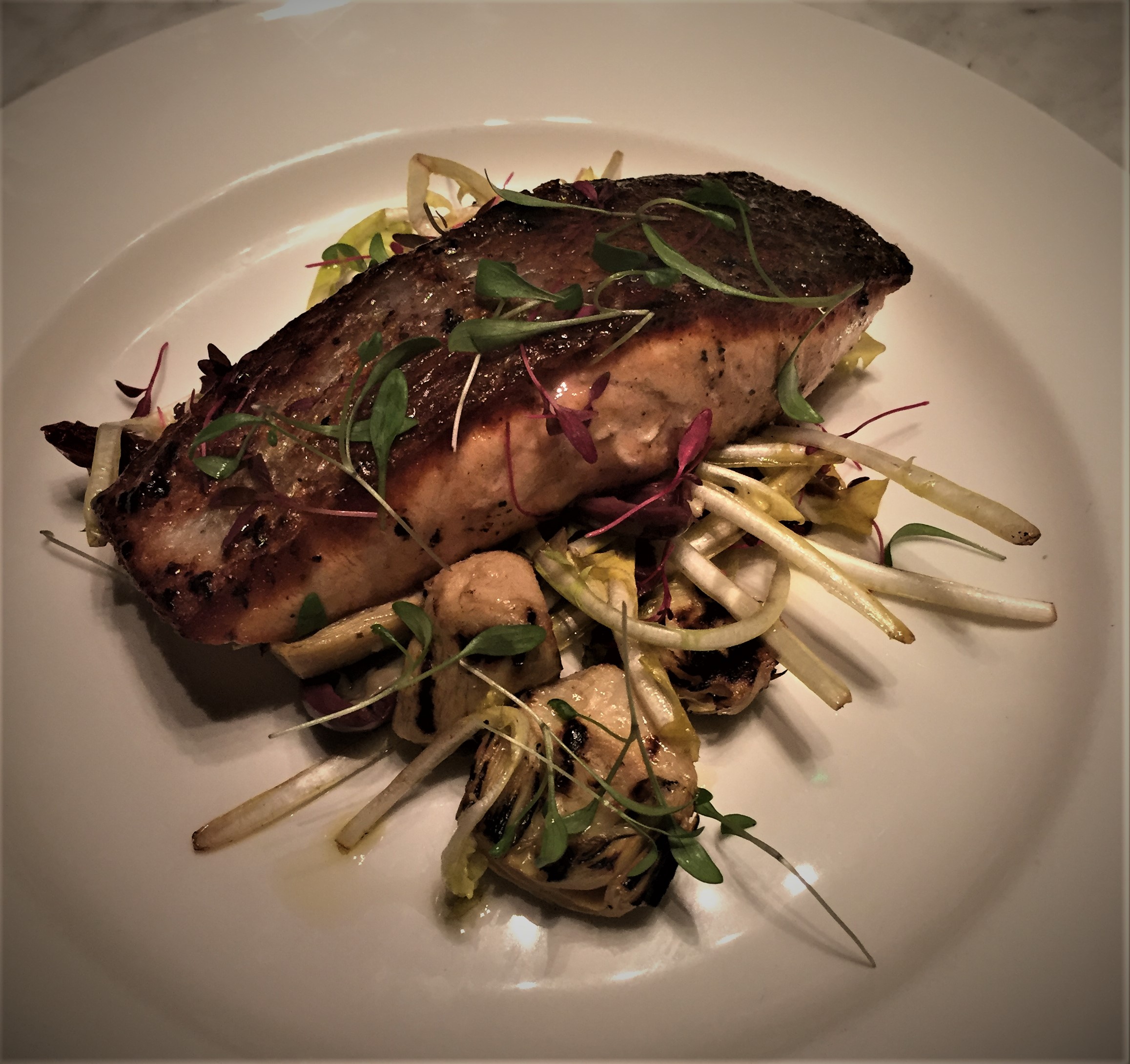 Honey glazed wild salmon fillet, grilled artichokes, dandelion leaves at Counter - kenningtonrunoff.com